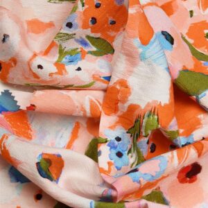Oranje blauwe bloemen crepe viscose