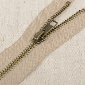 Metalen deelbare rits beige